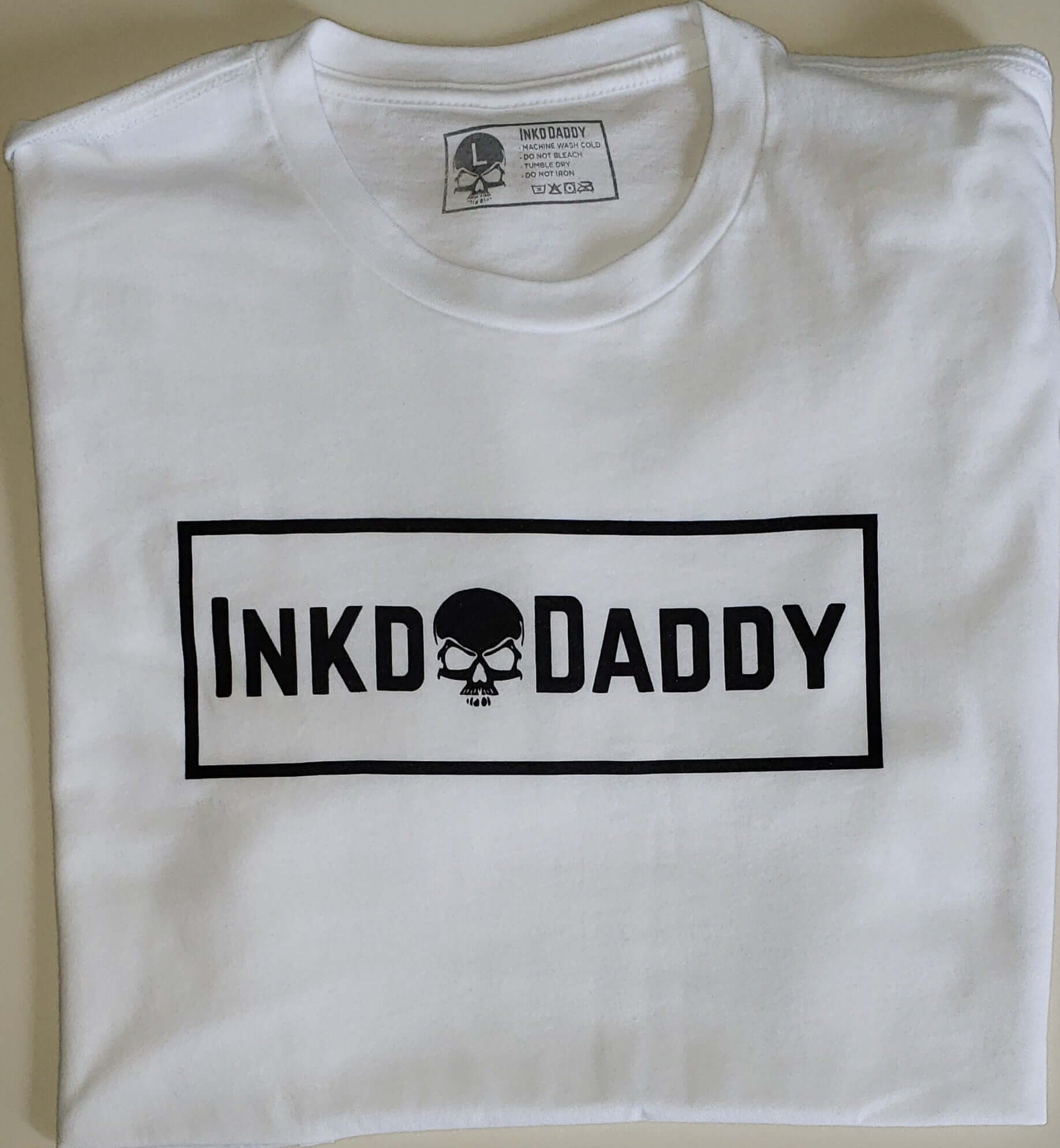 Inkddaddy skull on hats and shirts multiple colors