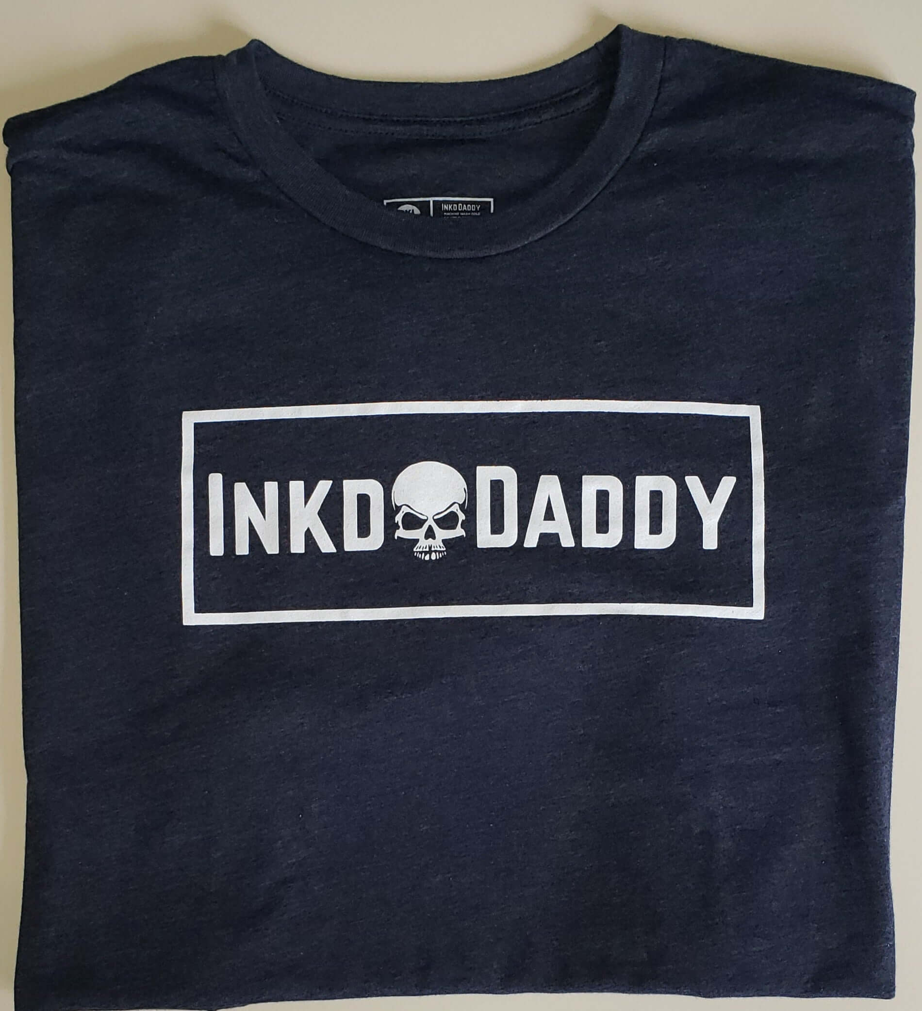 Inkddaddy skull on hats and shirts multiple colors