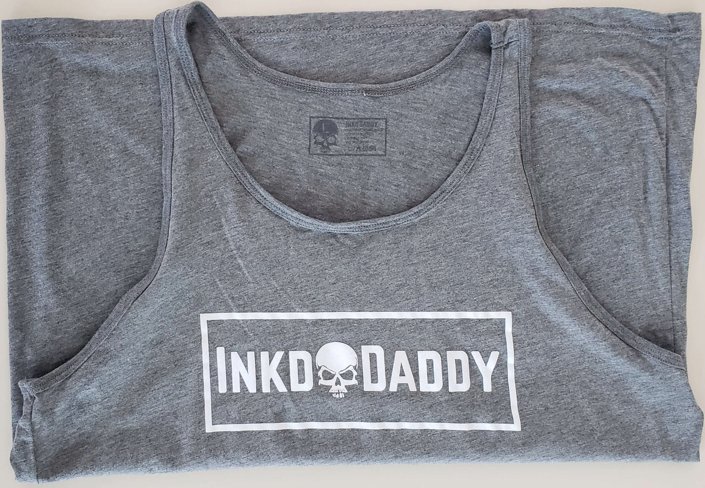 Inkddaddy skull on hats and shirts multiple colors