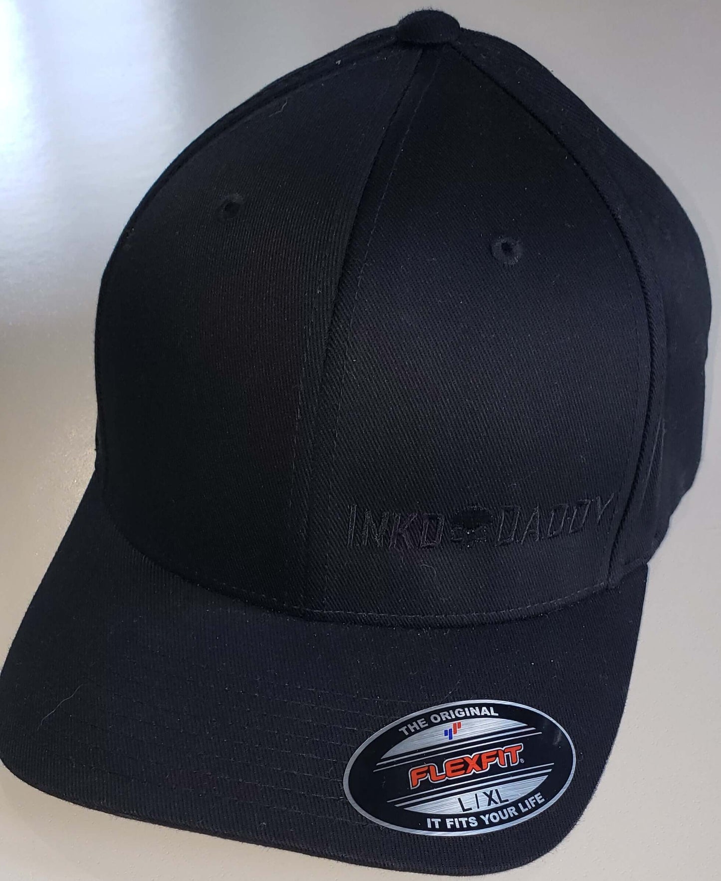 Inkddaddy skull on hats and shirts multiple colors