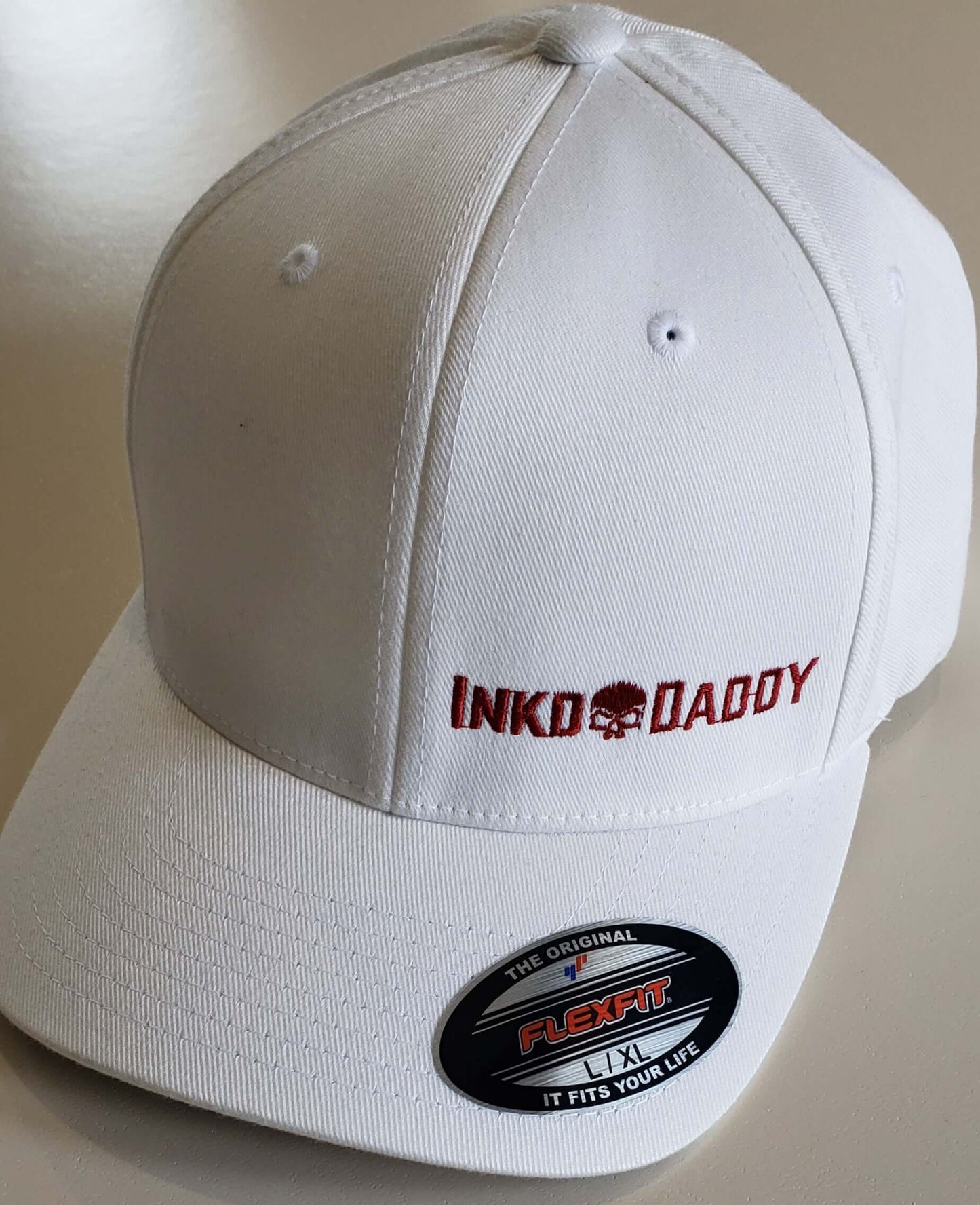 Inkddaddy skull on hats and shirts multiple colors