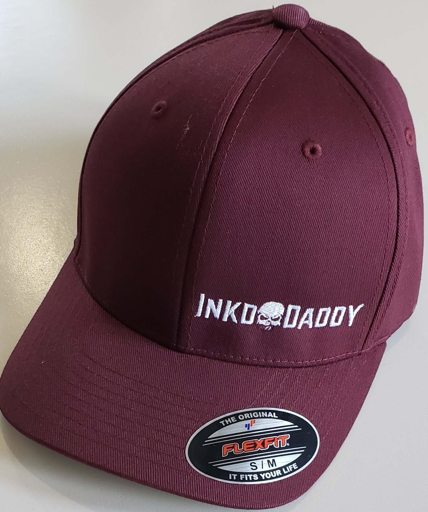 Inkddaddy skull on hats and shirts multiple colors