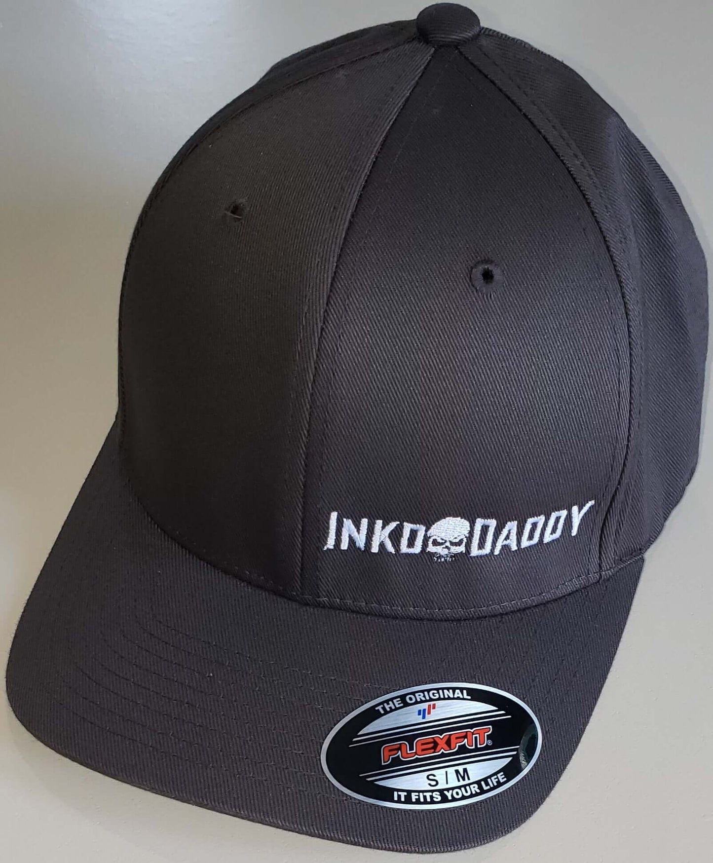 Inkddaddy skull on hats and shirts multiple colors